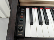 Load image into Gallery viewer, Yamaha Clavinova CLP-220 Digital Piano and stool in dark rosewood stock #23474