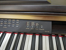 Load image into Gallery viewer, Yamaha Clavinova CLP-120 Digital Piano and stool in dark rosewood stock #23470