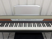 Load image into Gallery viewer, KORG SP-250 88 Key professional Piano with stand and sustain pedal stock #23484
