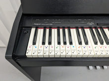 Load image into Gallery viewer, Roland F130R Digital Piano in black with matching colour stool stock # 23495