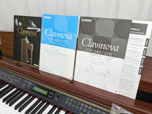 Load image into Gallery viewer, Yamaha Clavinova CLP-270 digital piano and stool in mahogany finish stock number 23497