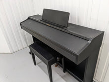 Load image into Gallery viewer, Roland RP301 digital piano and stool in satin black finish stock number 23508