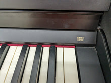 Load image into Gallery viewer, Roland RP301 digital piano and stool in satin black finish stock number 23508