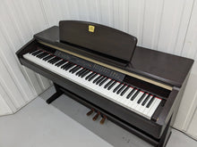 Load image into Gallery viewer, Yamaha Clavinova CLP-130 Digital Piano and stool in dark rosewood stock #24003