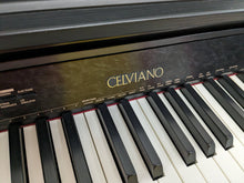 Load image into Gallery viewer, Casio Celviano AP-450 digital piano in satin black finish stock number 24005