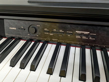 Load image into Gallery viewer, Casio Celviano AP-450 digital piano in satin black finish stock number 24005