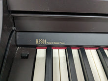 Load image into Gallery viewer, Roland RP301 digital piano + matching stool in dark rosewood stock number 24001