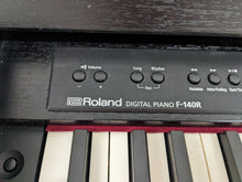 Load image into Gallery viewer, Roland F140R digital piano and stool in satin black finish stock number 24009