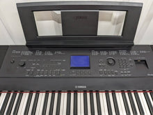Load image into Gallery viewer, Yamaha DGX-660 black portable grand piano keyboard + stand + stool stock #24012
