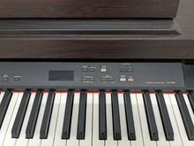 Load image into Gallery viewer, Yamaha Clavinova CLP-820 Digital Piano in dark rosewood stock nr 24002
