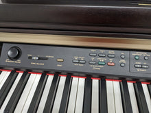 Load image into Gallery viewer, Yamaha Clavinova CLP-150 Digital Piano and stool in dark rosewood stock #24028