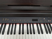 Load image into Gallery viewer, Yamaha Clavinova CLP-840 Digital Piano in dark rosewood stock #24030