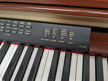 Load image into Gallery viewer, Yamaha Clavinova CLP-230 Digital Piano and stool in mahogany stock nr 24044