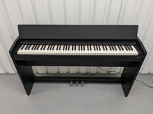 Load image into Gallery viewer, Roland F130R compact slim size Digital Piano in black stock # 24006