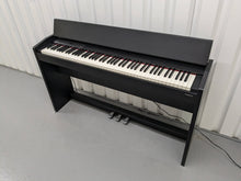 Load image into Gallery viewer, Roland F130R compact slim size Digital Piano in black stock # 24006