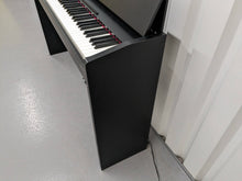 Load image into Gallery viewer, Roland F130R compact slim size Digital Piano in black stock # 24006