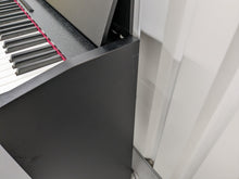 Load image into Gallery viewer, Roland F130R compact slim size Digital Piano in black stock # 24006