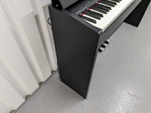 Load image into Gallery viewer, Roland F130R compact slim size Digital Piano in black stock # 24006