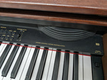 Load image into Gallery viewer, TECHNICS SX-PX665 DIGITAL PIANO IN MAHOGANY stock number 24050