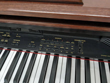 Load image into Gallery viewer, TECHNICS SX-PX665 DIGITAL PIANO IN MAHOGANY stock number 24050