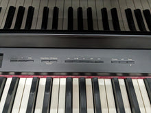 Load image into Gallery viewer, Roland HP508 digital piano and stool in polished glossy black stock number 24054