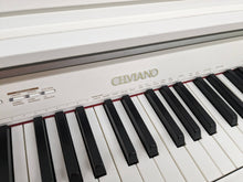 Load image into Gallery viewer, Casio Celviano AP-450 digital piano and stool in satin white finish stock #24065