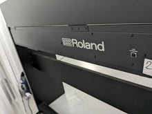 Load image into Gallery viewer, Roland F140R Digital Piano in black with matching colour stool stock # 24063