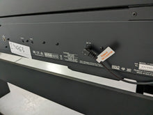 Load image into Gallery viewer, Roland F140R Digital Piano in black with matching colour stool stock # 24063