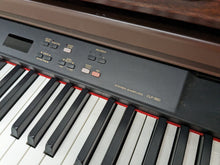 Load image into Gallery viewer, Yamaha Clavinova CLP-860 Digital Piano and stool in mahogany stock # 24096