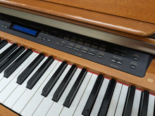 Load image into Gallery viewer, Yamaha Clavinova CLP-970 Digital Piano and stool in cherry wood stock nr 24105