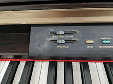 Load image into Gallery viewer, Yamaha Clavinova CLP-130 Digital Piano in dark rosewood stock #24103