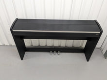 Load image into Gallery viewer, Roland F-110 compact slim size Digital Piano in black stock # 24126