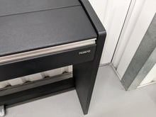 Load image into Gallery viewer, Roland F-110 compact slim size Digital Piano in black stock # 24126