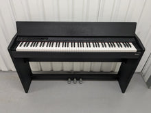 Load image into Gallery viewer, Roland F-110 compact slim size Digital Piano in black stock # 24126