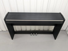 Load image into Gallery viewer, Roland F-110 compact slim size Digital Piano in black stock # 24129