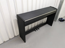 Load image into Gallery viewer, Roland F-110 compact slim size Digital Piano in black stock # 24129