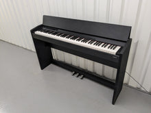 Load image into Gallery viewer, Roland F-110 compact slim size Digital Piano in black stock # 24129
