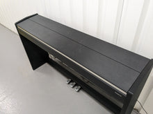 Load image into Gallery viewer, Roland F-110 compact slim size Digital Piano in black stock # 24129