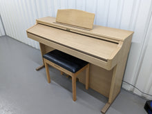 Load image into Gallery viewer, Roland HP102e digital piano and stool in light oak finish stock number 24134