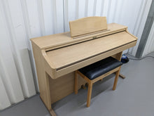 Load image into Gallery viewer, Roland HP102e digital piano and stool in light oak finish stock number 24134