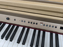 Load image into Gallery viewer, Roland HP102e digital piano and stool in light oak finish stock number 24134