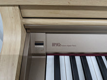 Load image into Gallery viewer, Roland HP102e digital piano and stool in light oak finish stock number 24134