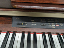 Load image into Gallery viewer, Yamaha Clavinova CLP-970 Digital Piano and stool in mahogany stock nr 25503