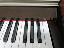 Load image into Gallery viewer, Casio Celviano AP-500 digital piano in mahogany finish stock number 24154