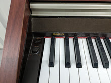 Load image into Gallery viewer, Casio Celviano AP-500 digital piano in mahogany finish stock number 24154