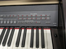 Load image into Gallery viewer, Yamaha Clavinova CVP-401 Digital Piano / arranger in rosewood with stool stock nr 24171