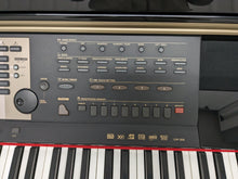 Load image into Gallery viewer, Clavinova CVP-209 in Polished Ebony with matching stool. stock nr 24175