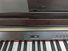 Load image into Gallery viewer, Yamaha Clavinova CLP-930 Digital Piano in dark rosewood stock #24187