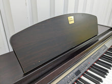 Load image into Gallery viewer, Yamaha Clavinova CLP-930 Digital Piano in dark rosewood stock #24187