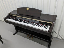 Load image into Gallery viewer, Yamaha Clavinova CLP-130 Digital Piano and stool in dark rosewood stock #24183